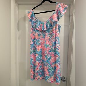 Gorgeous flutter flounce sleeve dress from Lily — like new.